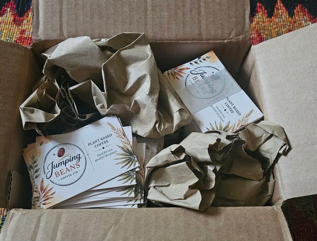 A box of Jumping Beans plant based coffee cards ready to send